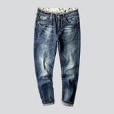 Vintage-Jeans für Herren mit bedruckten Taschen